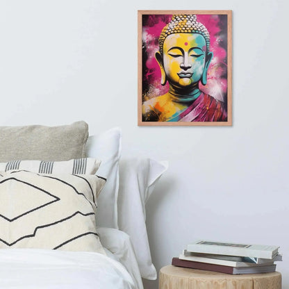 A vibrant framed poster of a stylized Modern Buddha Painting hangs on a white wall above a neatly arranged bed with plush pillows and a decorative cushion. A bedside table to the right holds a stack of books beside a white bed covered in crisp linen. A wooden tray with a black bowl and a jar rests on the bed, adding a homely touch to the modern, serene bedroom setting.