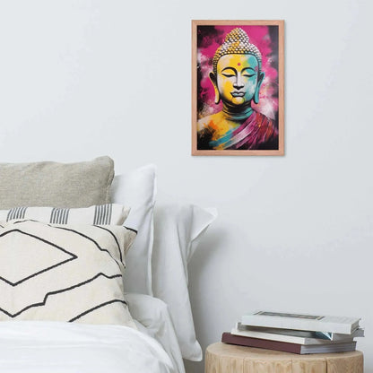 A vibrant framed poster of a stylized Modern Buddha Painting hangs on a white wall above a neatly arranged bed with plush pillows and a decorative cushion. A bedside table to the right holds a stack of books beside a white bed covered in crisp linen. A wooden tray with a black bowl and a jar rests on the bed, adding a homely touch to the modern, serene bedroom setting.