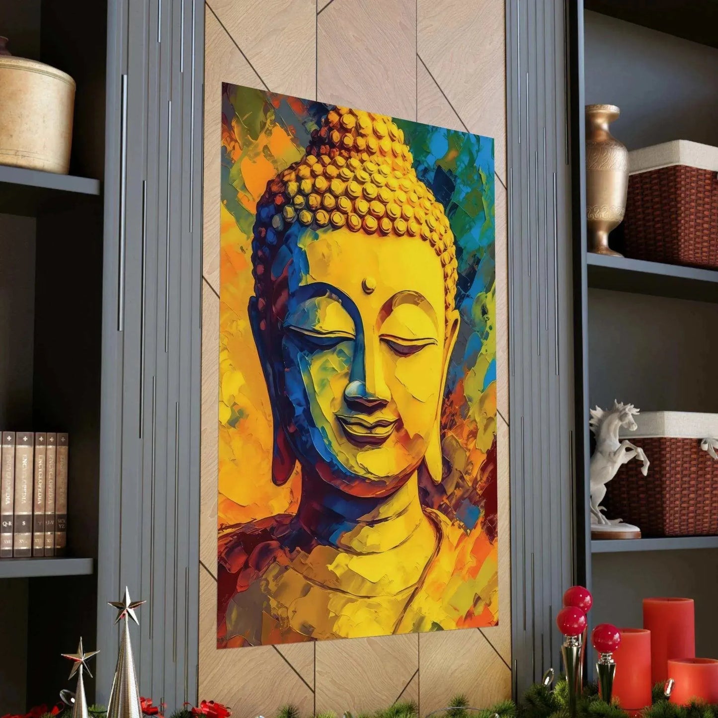 Vibrant portrait of the Buddha in rich shades of yellow, blue, and red, displayed prominently on a recessed wall niche, accompanied by festive holiday decor including red candles and silver star ornaments.